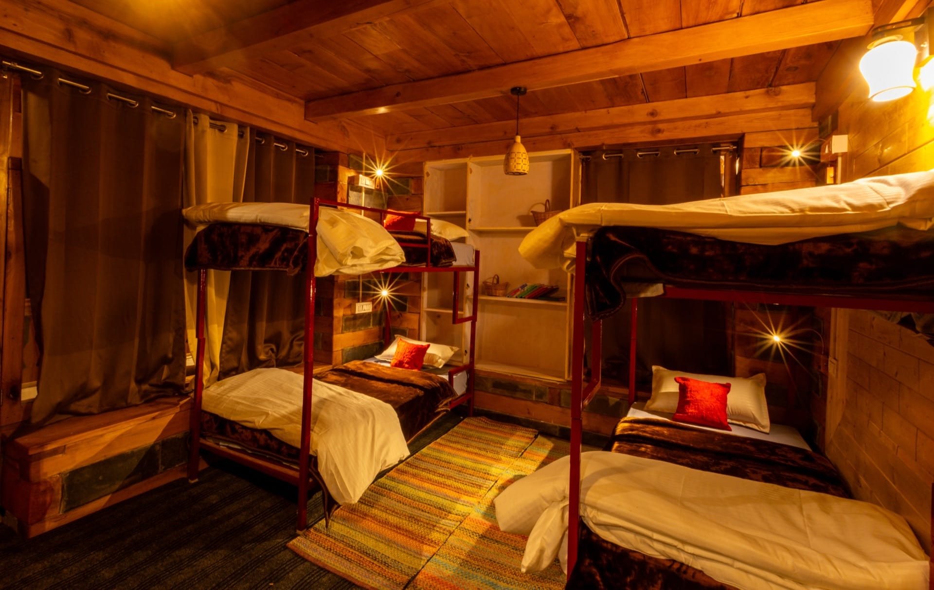 Milky Way Dorm — bunk beds in a timber room